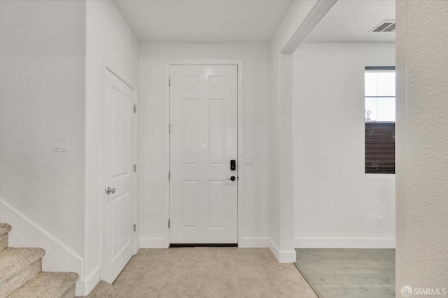 entryway with light wood-type flooring