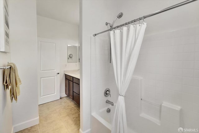 bathroom with tile patterned floors, vanity, and shower / bath combo