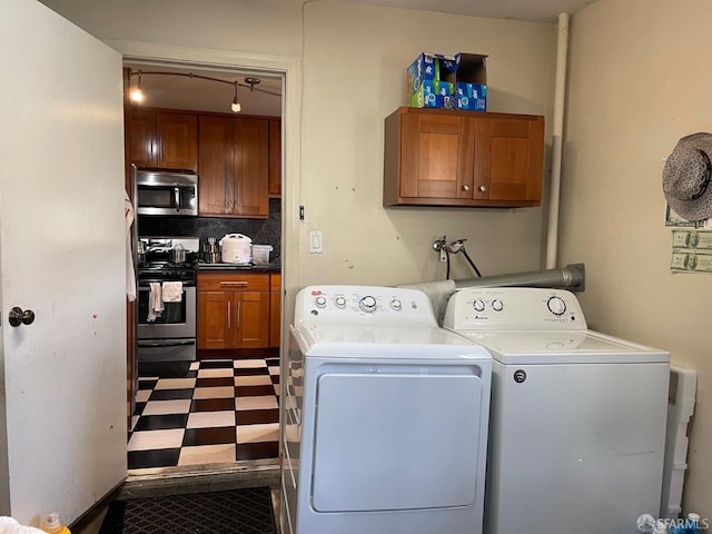 laundry area featuring separate washer and dryer