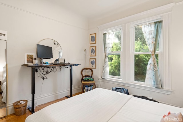 bedroom featuring hardwood / wood-style floors