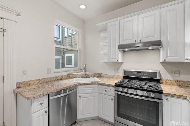 kitchen with sink, white cabinetry, and stainless steel appliances