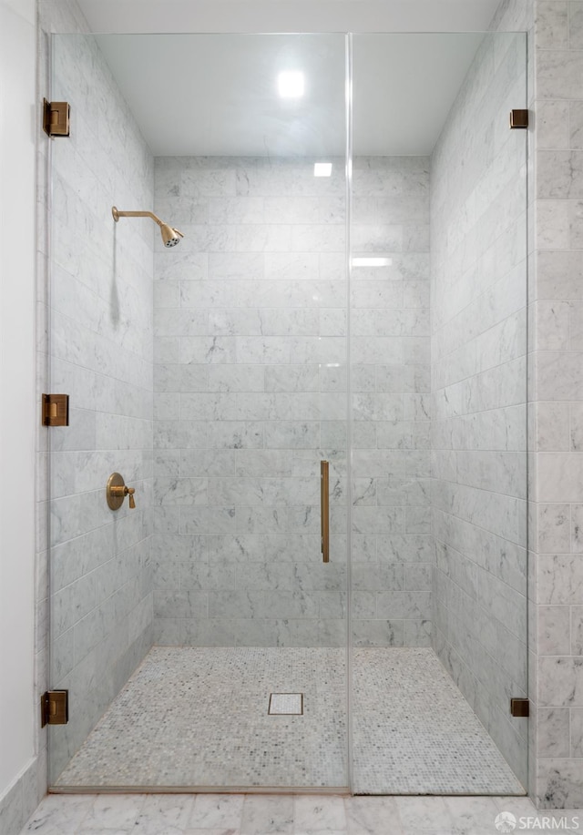 bathroom featuring a stall shower