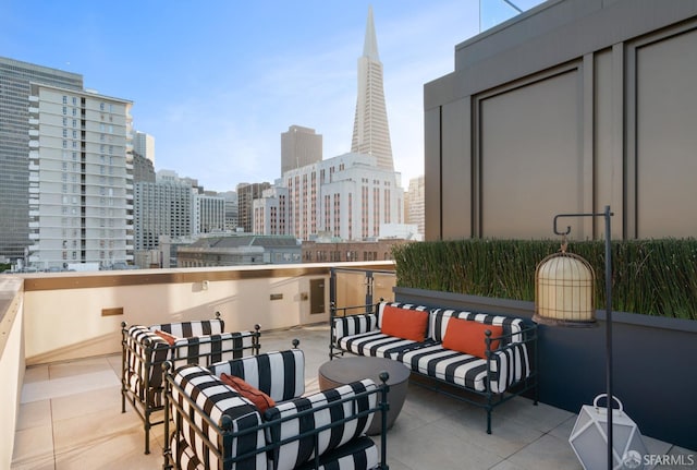 balcony featuring a city view