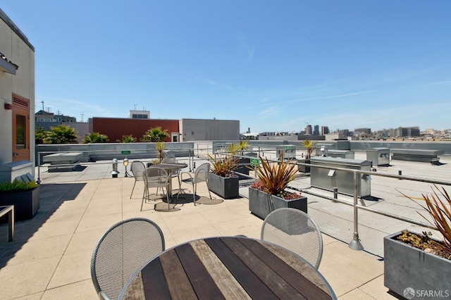 451 Kansas St Unit 428, San Francisco, CA 94107 - view of patio with outdoor dining space and a city view