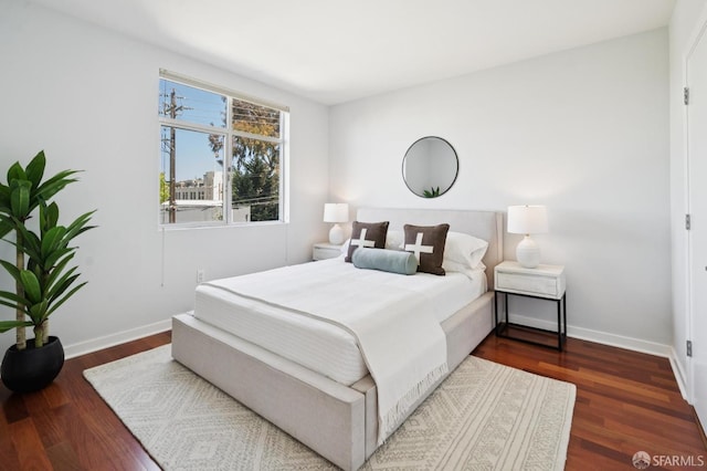 451 Kansas St Unit 428, San Francisco, CA 94107 - bedroom featuring dark wood-type flooring and baseboards