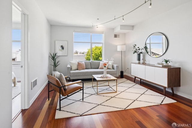 451 Kansas St Unit 428, San Francisco, CA 94107 - living area featuring healthy amount of natural light, wood finished floors, and track lighting