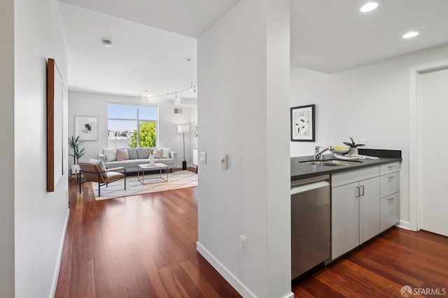 451 Kansas St Unit 428, San Francisco, CA 94107 - bar featuring stainless steel dishwasher, dark wood-style floors, and recessed lighting