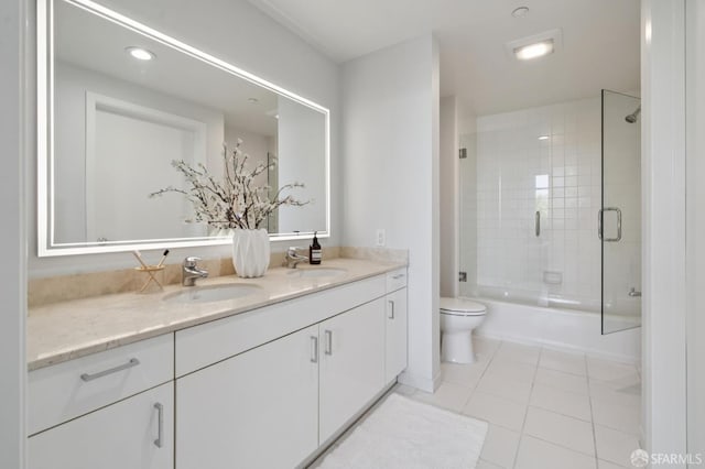 451 Kansas St Unit 428, San Francisco, CA 94107 - bathroom with double vanity, tile patterned floors, bath / shower combo with glass door, and recessed lighting