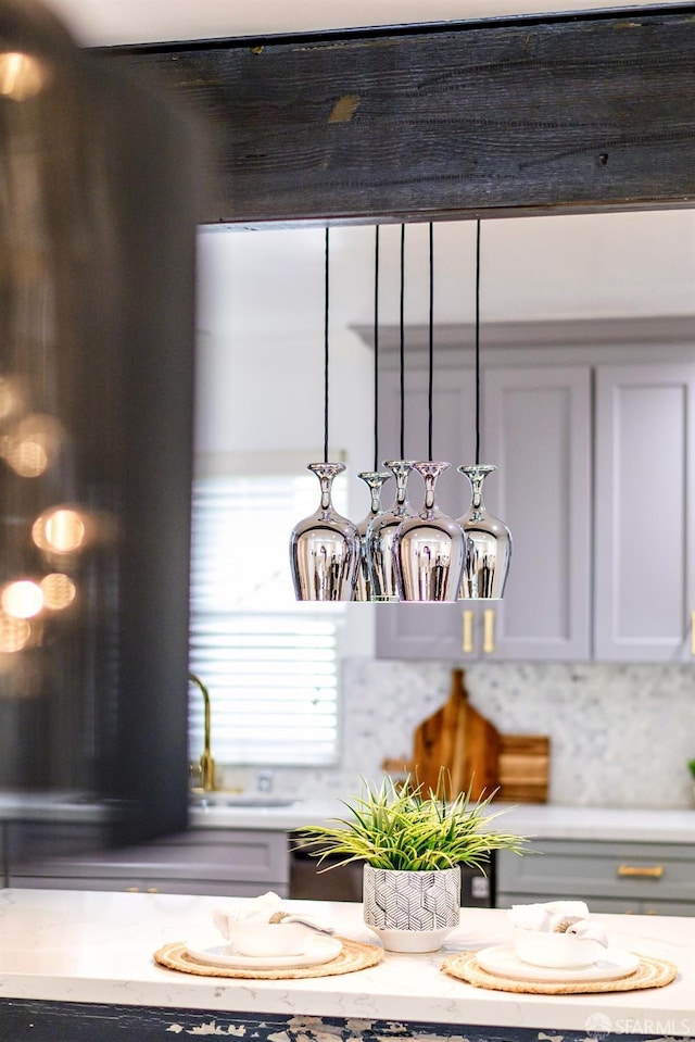 room details with light countertops and a sink