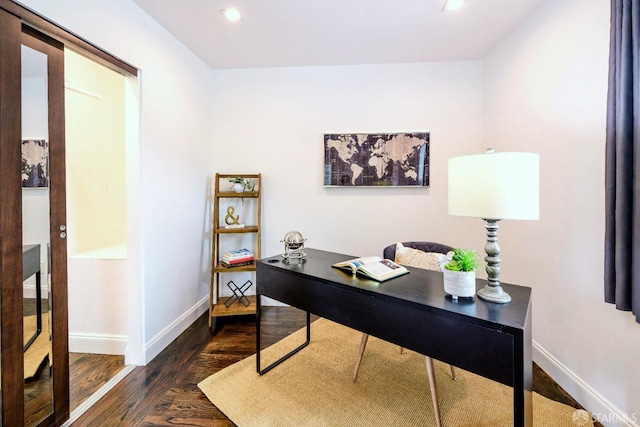 office space featuring dark wood-style flooring, recessed lighting, and baseboards