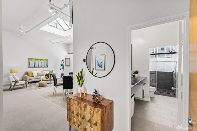 hallway with a skylight