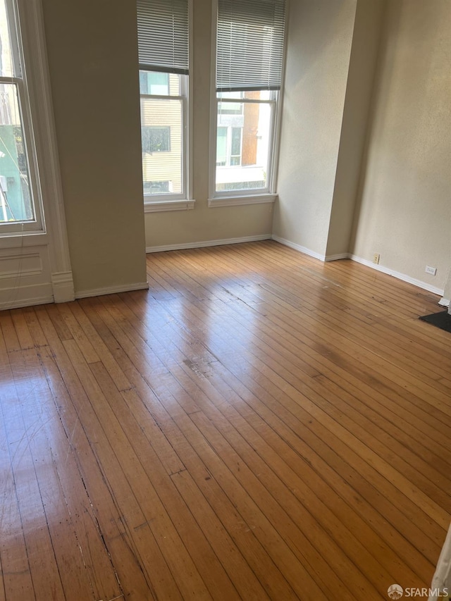 empty room with light wood-type flooring