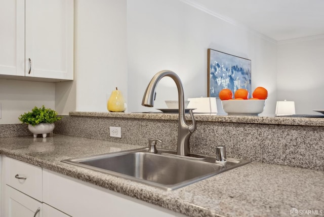 3901 Lick Mill Blvd Unit 165, Santa Clara, CA 95054 - kitchen view of a sink, white cabinets, crown molding, and light countertops