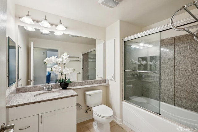 3901 Lick Mill Blvd Unit 165, Santa Clara, CA 95054 - bathroom featuring tile patterned flooring, toilet, vanity, and bath / shower combo with glass door