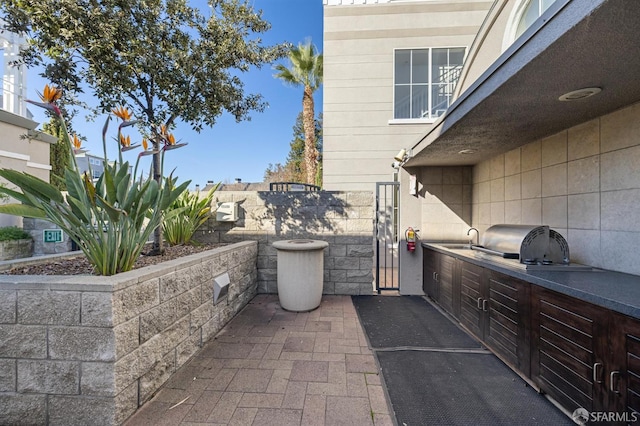 3901 Lick Mill Blvd Unit 165, Santa Clara, CA 95054 - view of patio / terrace with a sink and a gate