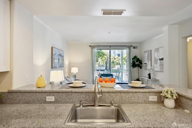 3901 Lick Mill Blvd Unit 165, Santa Clara, CA 95054 - kitchen with a sink, light stone counters, and open floor plan