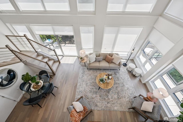 1605 Riviera Ave Unit 608, Walnut Creek, CA 94596 - living room featuring wood finished floors and a high ceiling