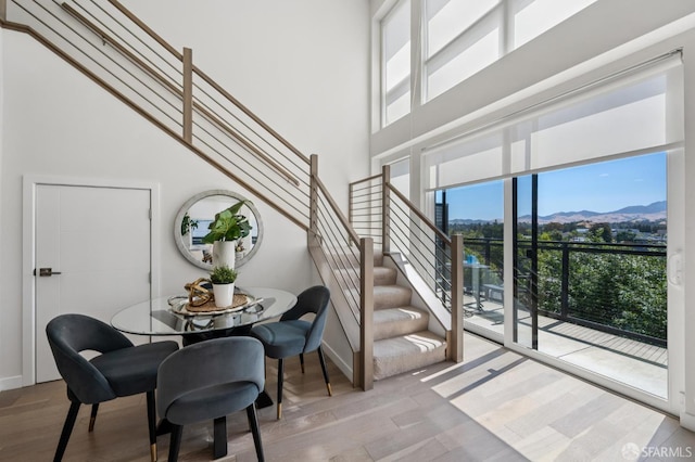 1605 Riviera Ave Unit 608, Walnut Creek, CA 94596 - stairway with wood finished floors, plenty of natural light, a high ceiling, and a mountain view