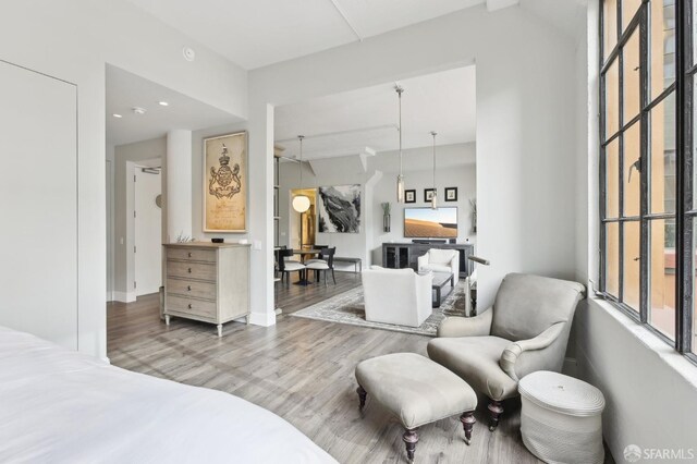 bedroom featuring wood finished floors