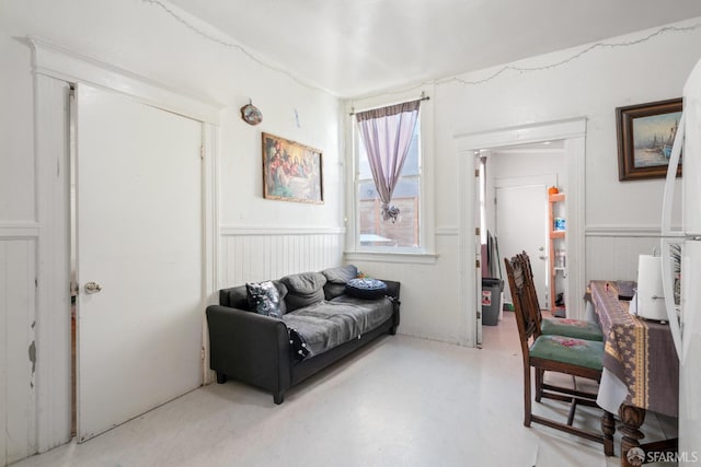 sitting room featuring wainscoting