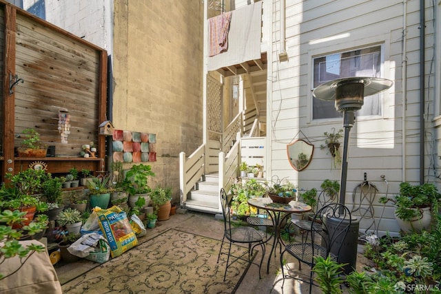 view of patio / terrace featuring stairway