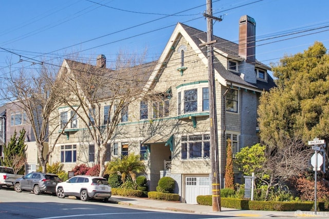 view of front of property with a garage