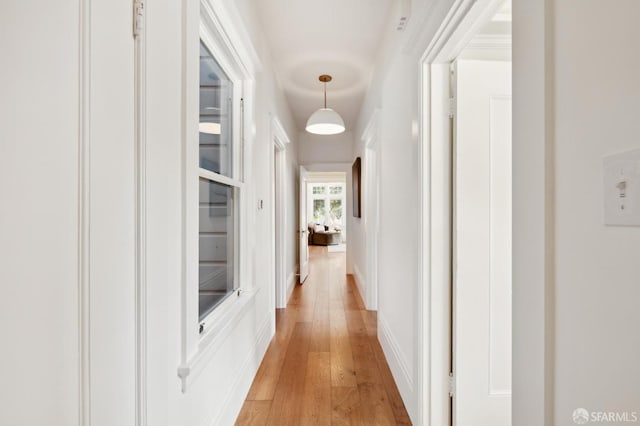 hall with light wood-type flooring