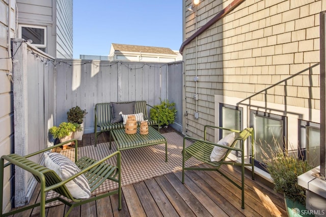 wooden balcony featuring a wooden deck