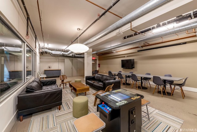 living room featuring baseboards