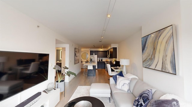 living room with light hardwood / wood-style floors