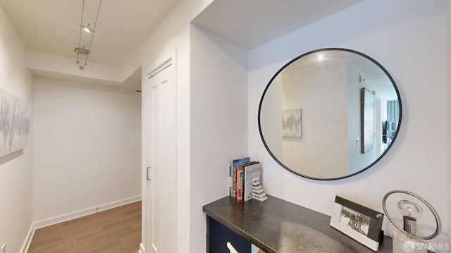 hall with dark hardwood / wood-style floors