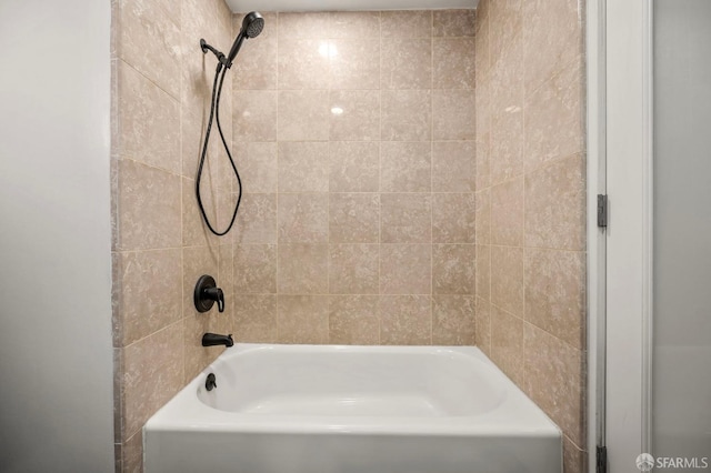 bathroom with shower / bathing tub combination