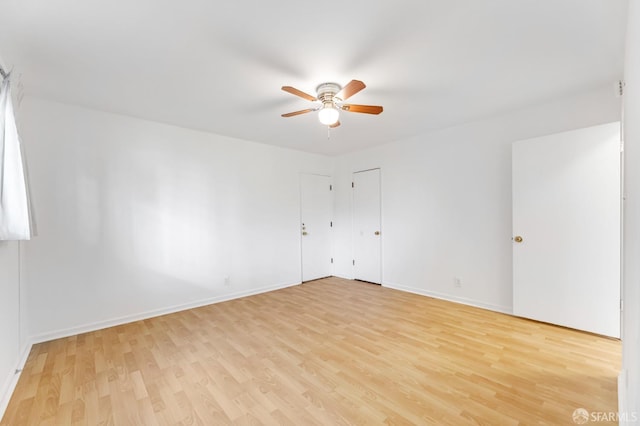 5020 Clarke St, Oakland, CA 94609 - empty room with light wood-type flooring, baseboards, and ceiling fan