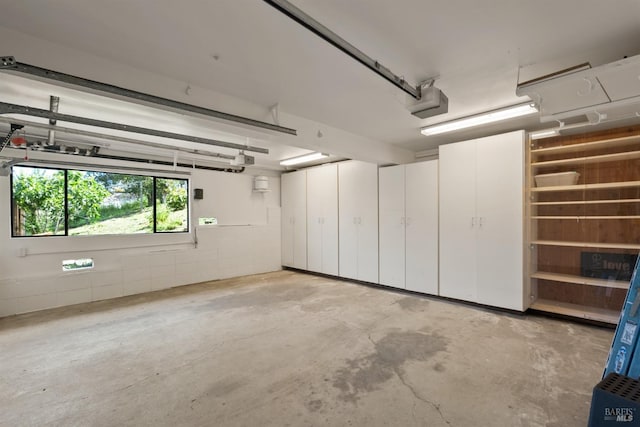 garage featuring a garage door opener
