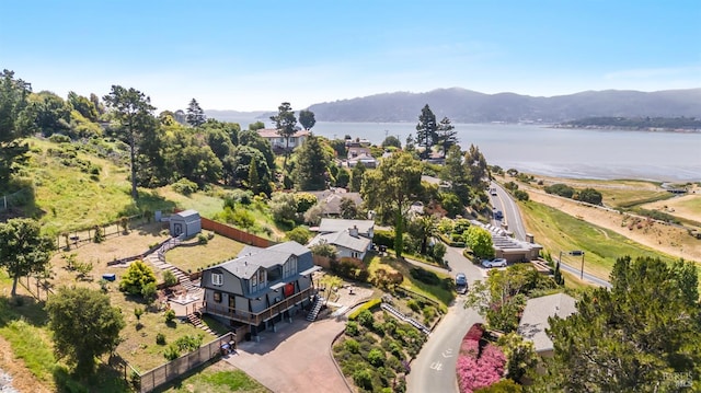 bird's eye view featuring a water and mountain view