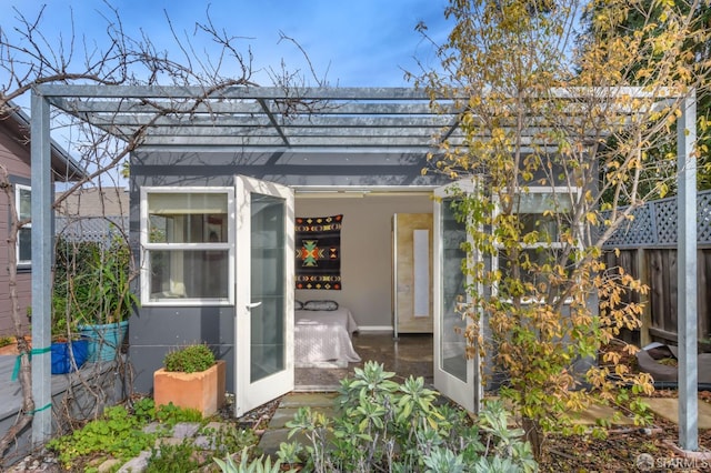 view of outbuilding with a sunroom