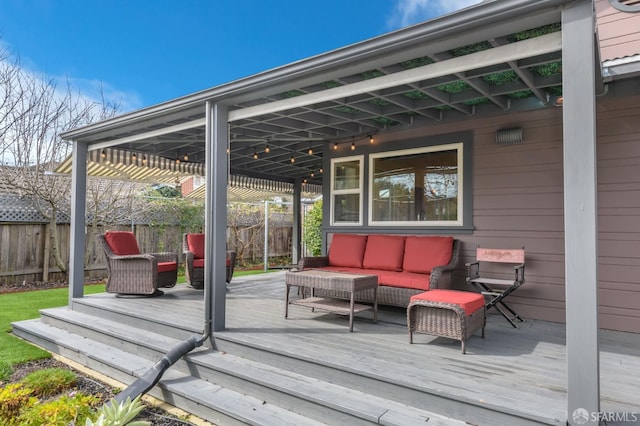 wooden deck featuring an outdoor living space