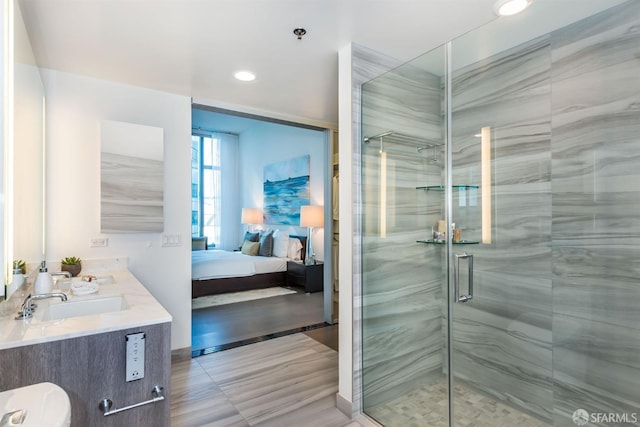 333 Beale St Unit 4E, San Francisco, CA 94105 - ensuite bathroom with double vanity, a shower stall, and recessed lighting