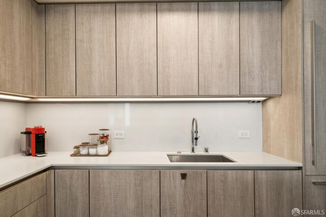 333 Beale St Unit 4E, San Francisco, CA 94105 - kitchen with a sink, modern cabinets, and light countertops