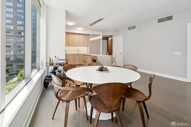333 Beale St Unit 4E, San Francisco, CA 94105 - dining space with wood finished floors and baseboards