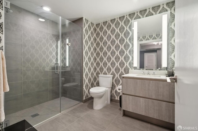 333 Beale St Unit 4E, San Francisco, CA 94105 - bathroom with toilet, a tile shower, vanity, and tile patterned floors