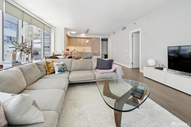 333 Beale St Unit 4E, San Francisco, CA 94105 - living room with wood finished floors and baseboards