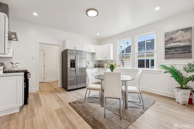 1015 Key Ave, San Francisco, CA 94124 - dining room with light wood-style flooring and recessed lighting