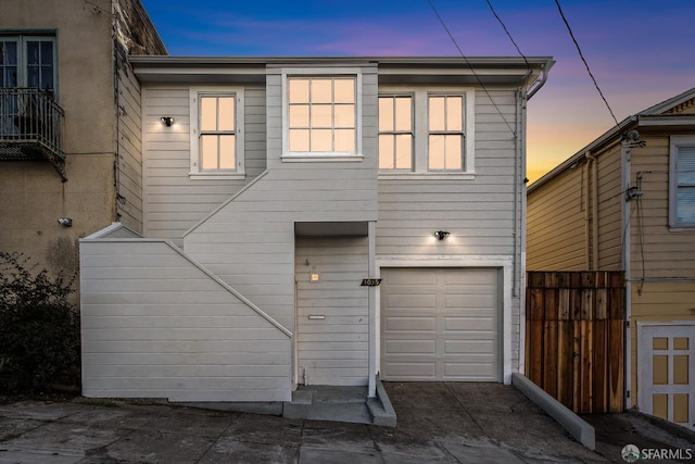 1015 Key Ave, San Francisco, CA 94124 - back of property featuring a garage and concrete driveway