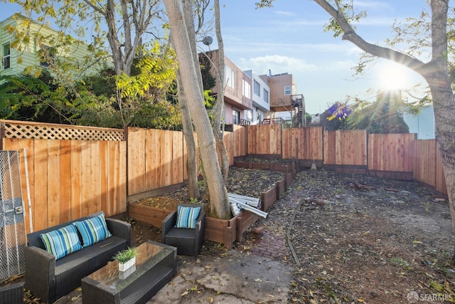 1015 Key Ave, San Francisco, CA 94124 - fenced backyard featuring an outdoor living space and a patio area