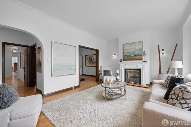 57 Masonic Ave, San Francisco, CA 94118 - living area with arched walkways, crown molding, and a glass covered fireplace