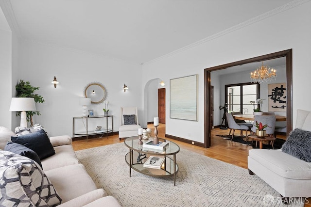 57 Masonic Ave, San Francisco, CA 94118 - living area featuring arched walkways, a chandelier, ornamental molding, and wood finished floors