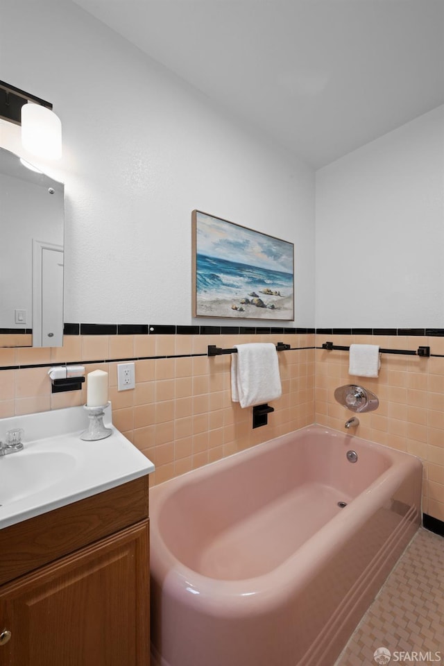 57 Masonic Ave, San Francisco, CA 94118 - bathroom featuring tile walls, vanity, a garden tub, and wainscoting