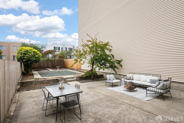 57 Masonic Ave, San Francisco, CA 94118 - fenced backyard with an outdoor living space, a patio area, and outdoor dining space