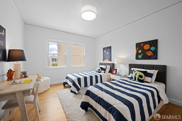 57 Masonic Ave, San Francisco, CA 94118 - bedroom featuring baseboards and wood finished floors